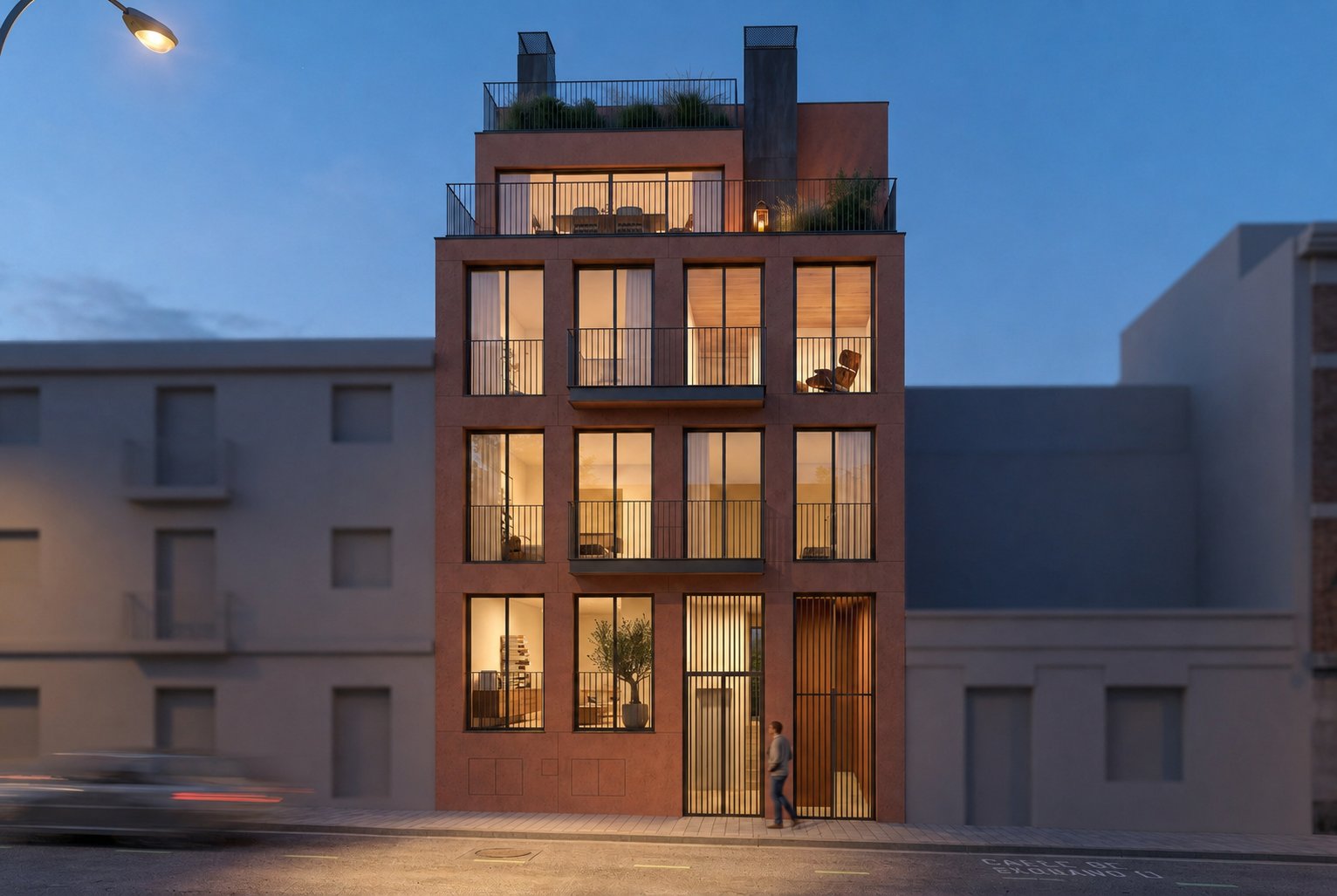 Fachada de Verja 19, edificio de obra nueva en Usera Madrid al atardecer
